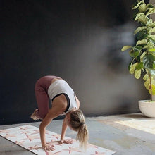 Load image into Gallery viewer, white female doing crow pose on yoga mat with pink star design

