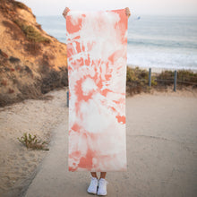 Load image into Gallery viewer, pink tie dye yoga mat being held up next to the ocean
