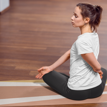 Load image into Gallery viewer, female stretching on yoga mat with sun design
