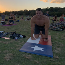 Load image into Gallery viewer, white male on state of texas yoga mat at park
