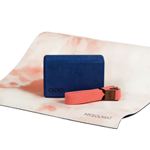 Load image into Gallery viewer, Navy blue yoga block on pink mat with pink yoga strap
