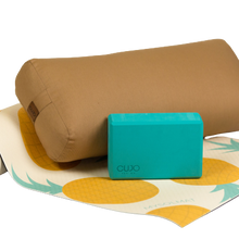 Load image into Gallery viewer, Cyan yoga block on pineapple yoga mat with brown bolster
