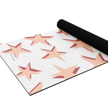 Load image into Gallery viewer, yoga mat with pink star design half rolled up
